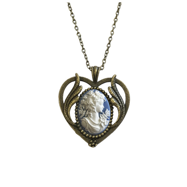 Jewelry Jewelry Lady with butterfly on a blue background in a gold heart setting. Setting measures 1-3/4″x 1-1/2″. The chain is 24″ with a lobster clasp.