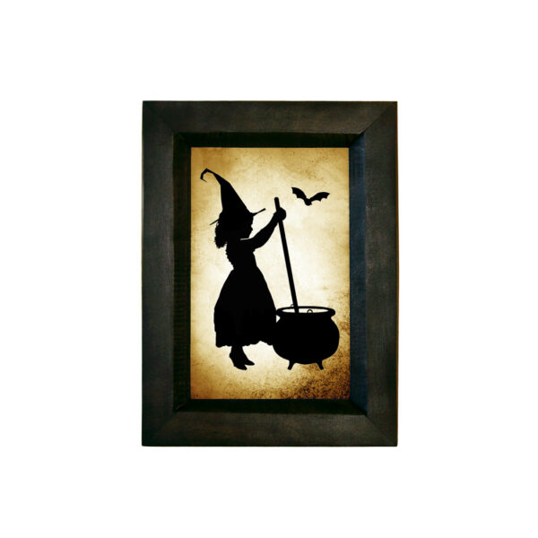 Framed Silhouette Halloween Girl Witch Stirring Pot Printed Paper Silhouette Behind Glass in Black Wood frame. 5-1/2″ x 7-1/2″