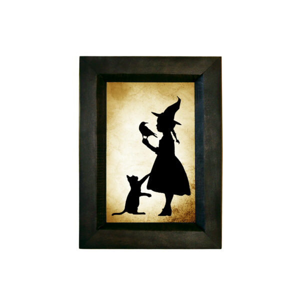 Framed Silhouette Halloween Girl Witch with Raven Printed Paper Silhouette Behind Glass in Black Wood frame. 5-1/2″ x 7-1/2″