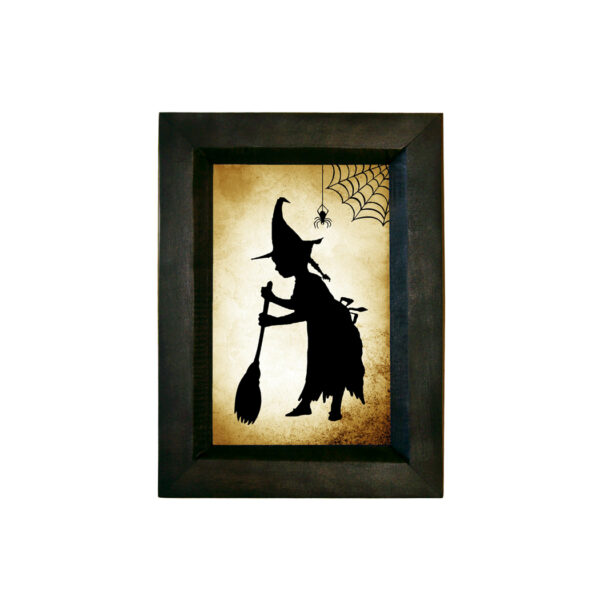 Framed Silhouette Halloween Girl Witch Sweeping Printed Paper Silhouette Behind Glass in Black Wood frame. 5-1/2″ x 7-1/2″