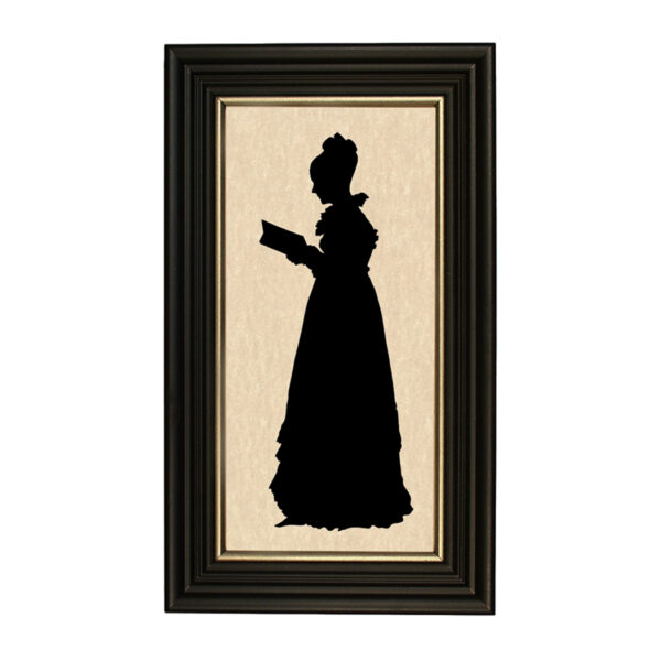 Early American Early American Bonita Reading a Book Framed Paper Cut Silhouette in Black Wood Frame with Gold Trim. A 5″ x 10″ framed to 7″ x 12″.