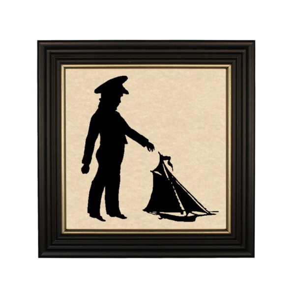 Silhouettes Nautical Boy with Pond Boat Framed Paper Cut Silhouette in Black Wood Frame with Gold Trim. Framed to 10 x 10″.