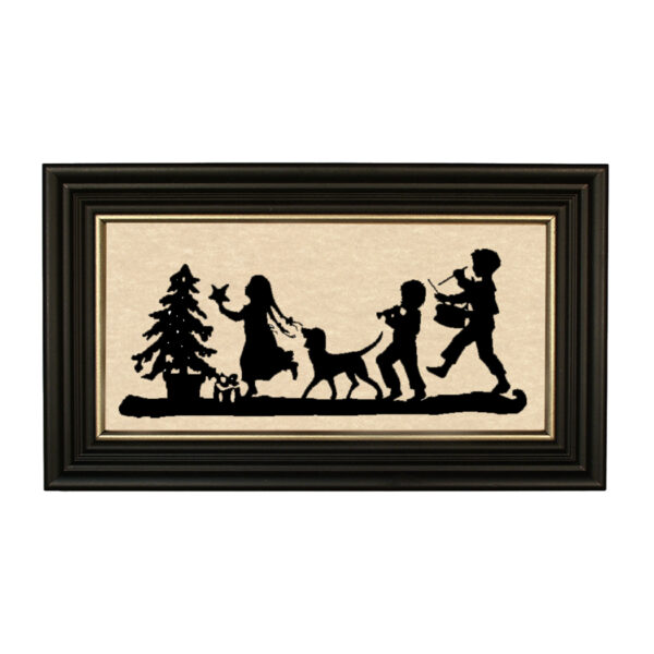 Christmas Children Deck the Tree Framed Paper Cut Silhouette in Black Wood Frame with Gold Trim. A 5″ x 10″ framed to 7″ x 12″.