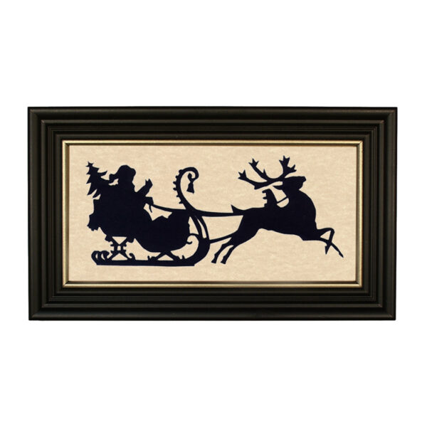 Silhouettes Christmas Sleigh Bells Ringing Framed Paper Cut Silhouette in Black Wood Frame with Gold Trim. A 5″ x 10″ framed to 7″ x 12″.