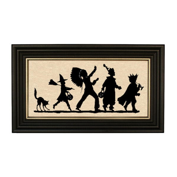 Framed Silhouette Halloween Halloween Parade Framed Paper Cut Silhouette in Black Wood Frame with Gold Trim. A 5″ x 10″ framed to 7″ x 12″.