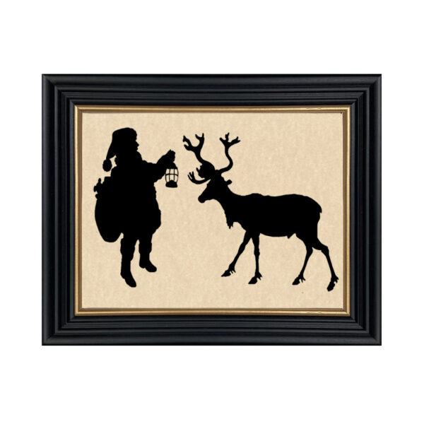 Silhouettes Christmas Santa and Reindeer Framed Paper Cut Silhouette in Black Wood Frame with Gold Trim. An 8 x 10″ framed to 10 x 12″.