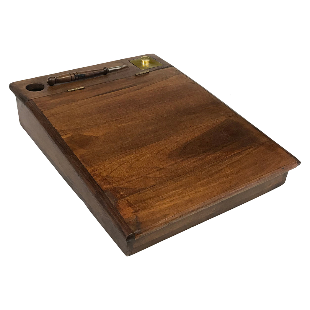 this writing desk has a lid that will open to store papers includes brass inkwell black ink powder and a wood nib pen 1 1 4 hole for a reading